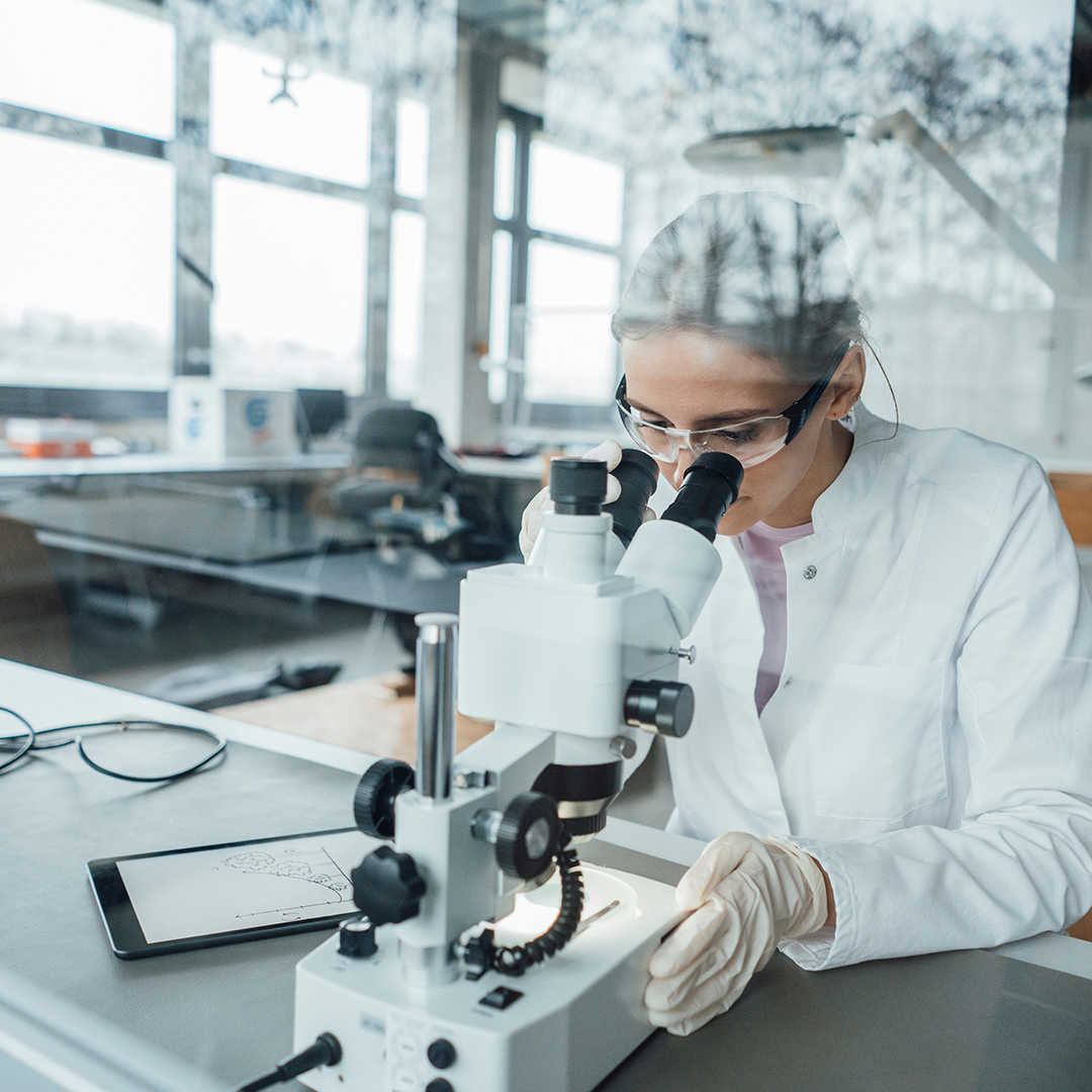 scientist-using-microscope-in-lab-hero