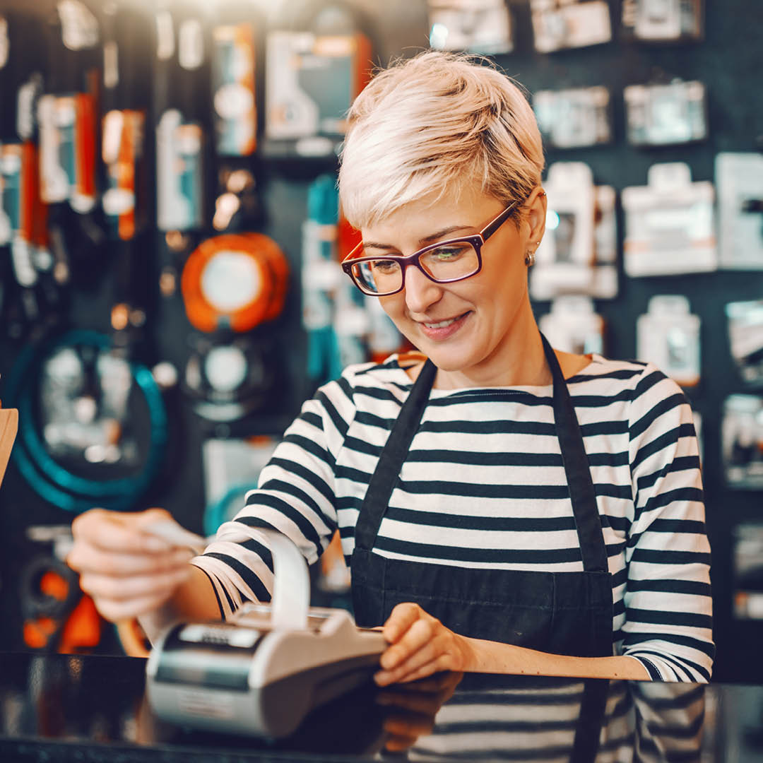 shop-owner-at-pos-system-hero