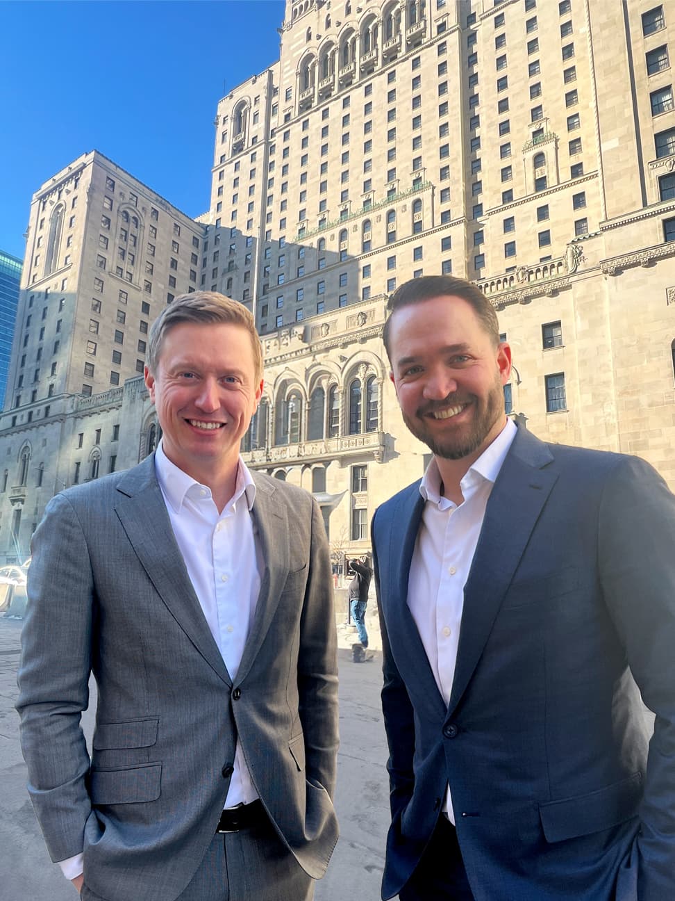 Mark Sparrow and Luke Scheer standing in front of the Royal York Hotel