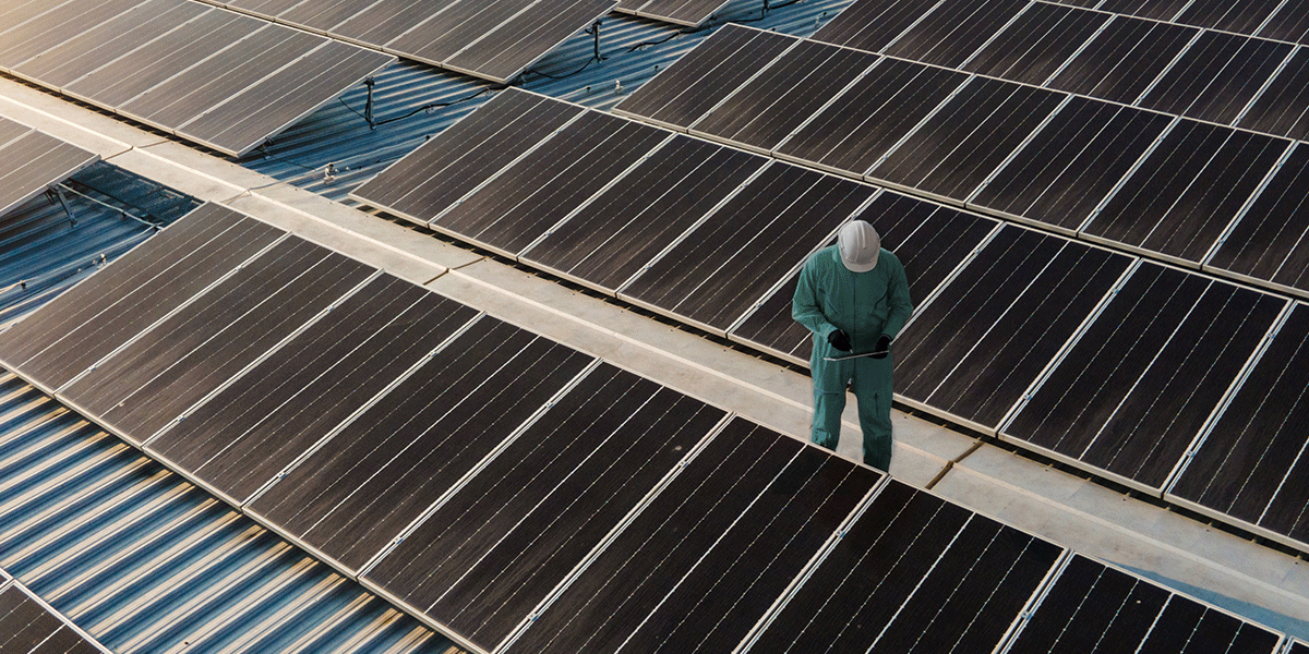Man working with solar panels