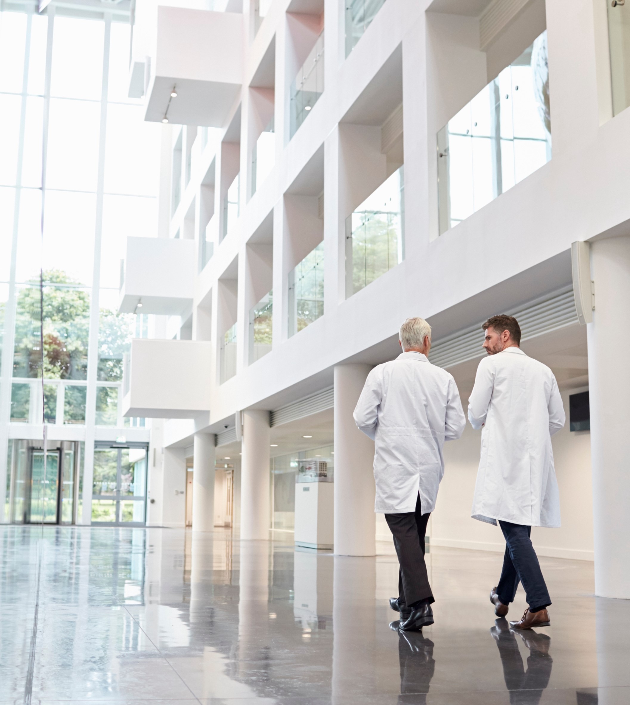 doctors walking in hospital