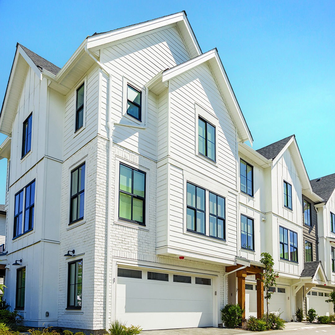 Townhouses with a blue sky in the background