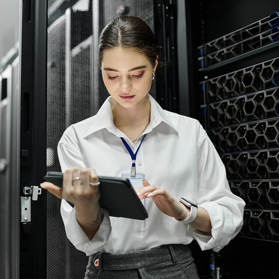 Women working on ipad in data center