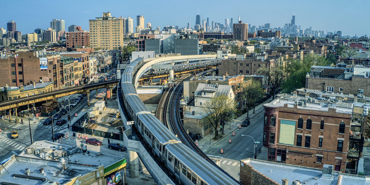 chicago L train passing through the city