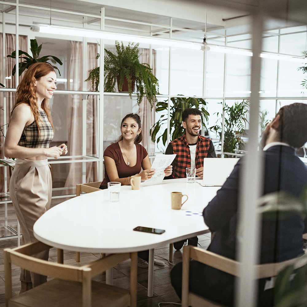 A group of professionals gathered around a table