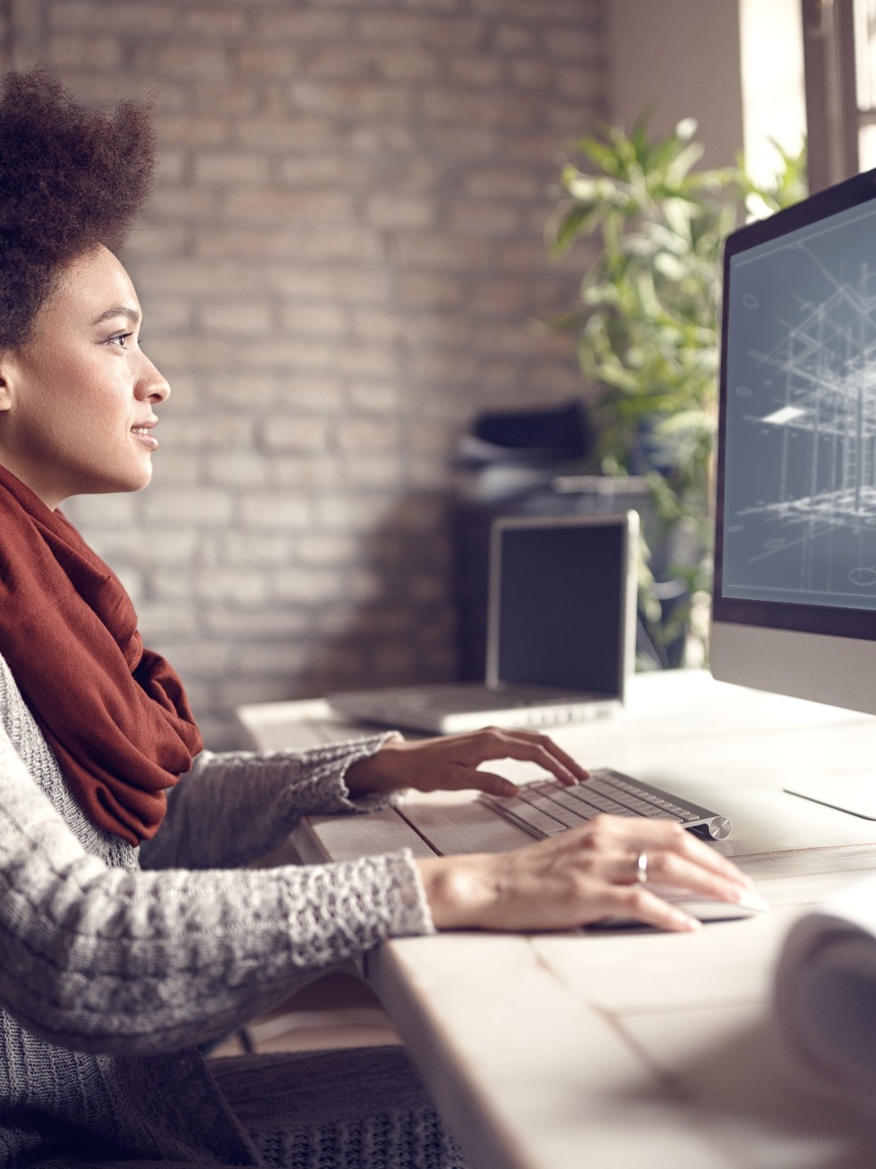 female architect working on computer