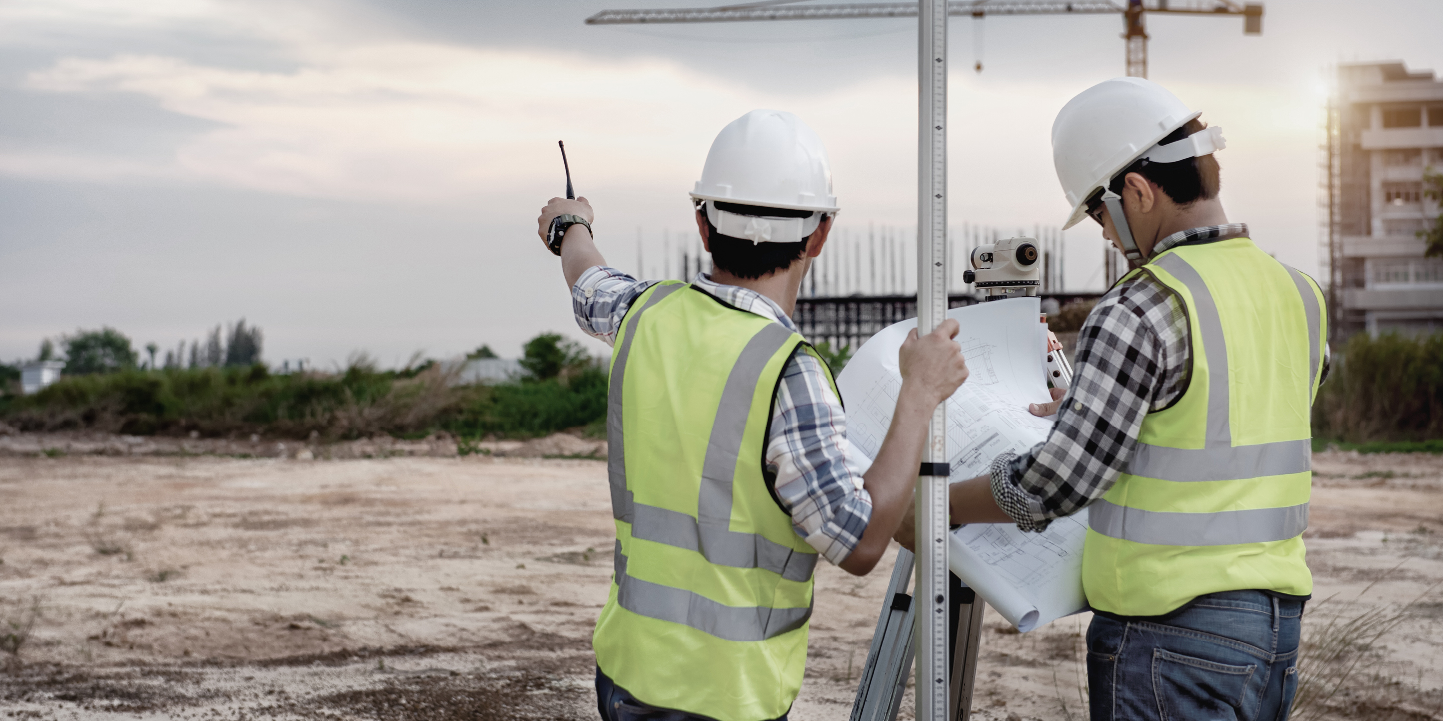 Two Construction Workers Building