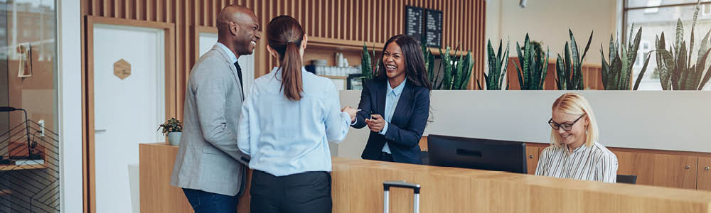 Image of hotel lobby and guests