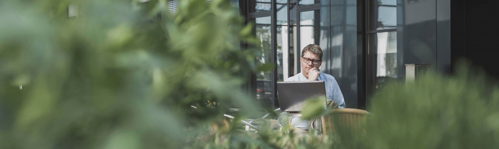 Image of man on office patio