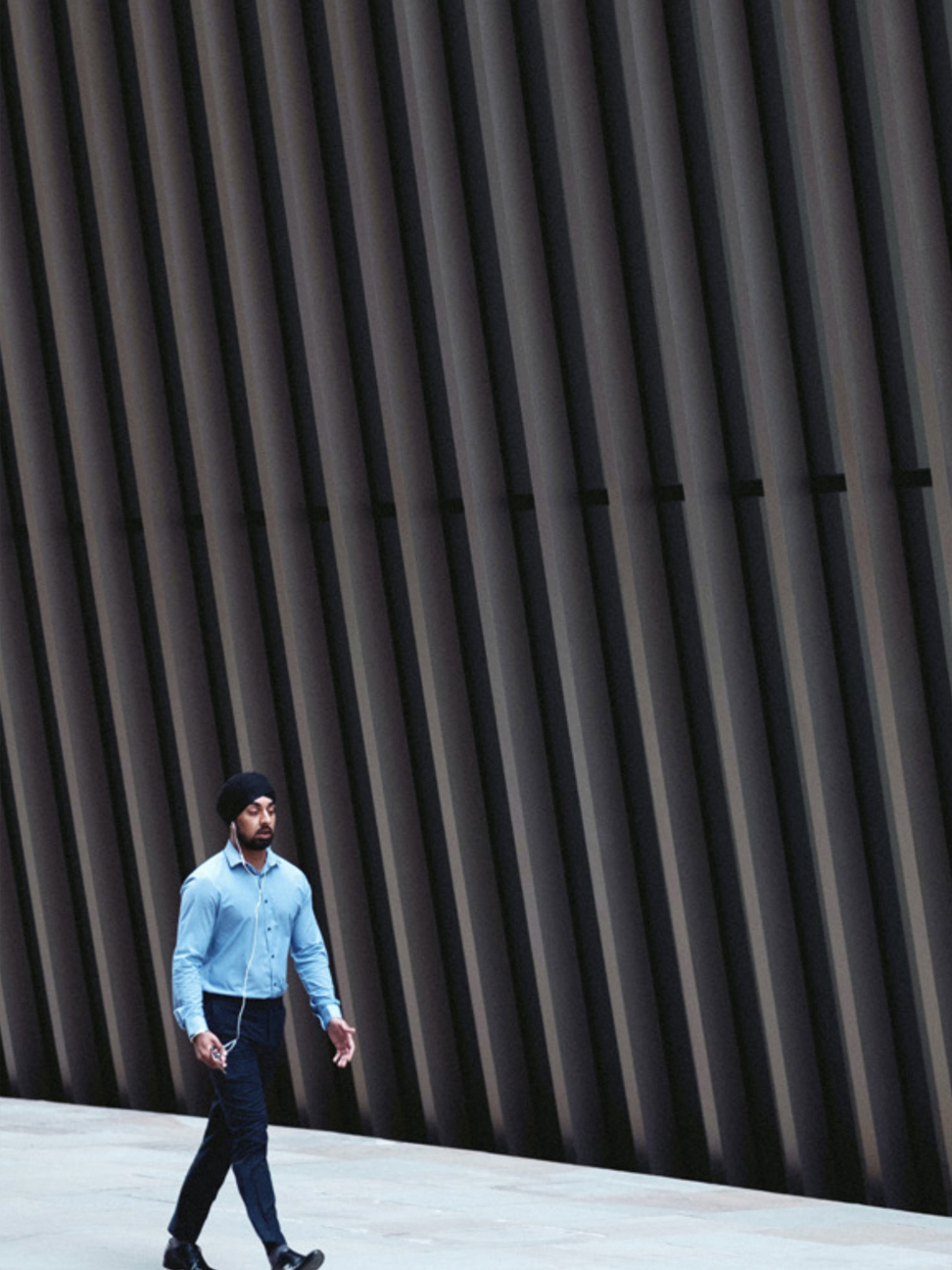tech talent walking by office building