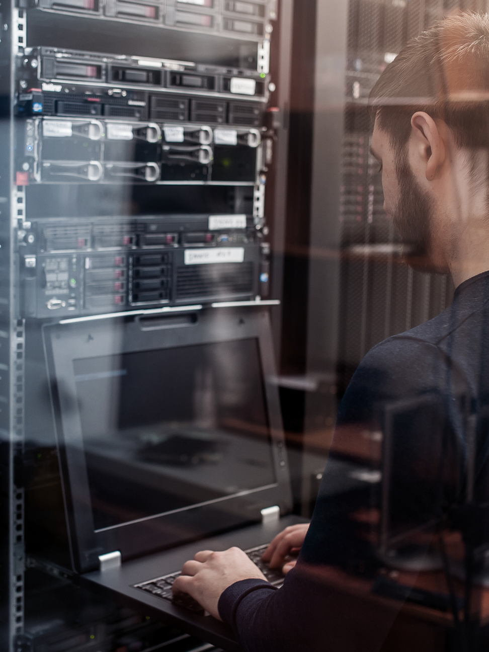 Network engineer working in a server room