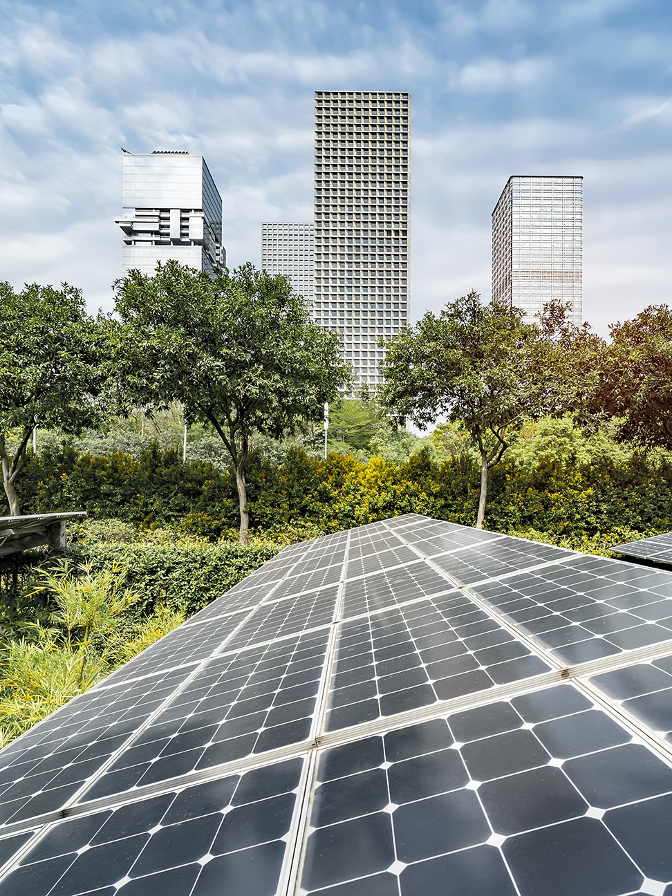 solar panels with cityscape in background