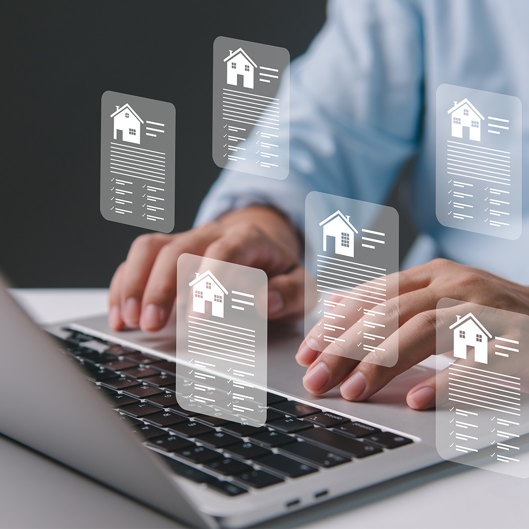 Person searching for a new home on a laptop