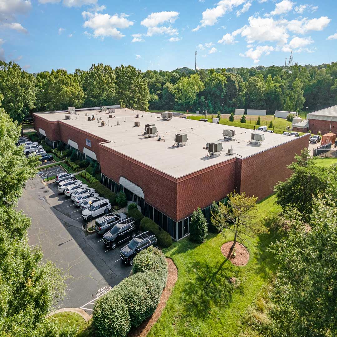 Aerial exterior of the building and parking lot