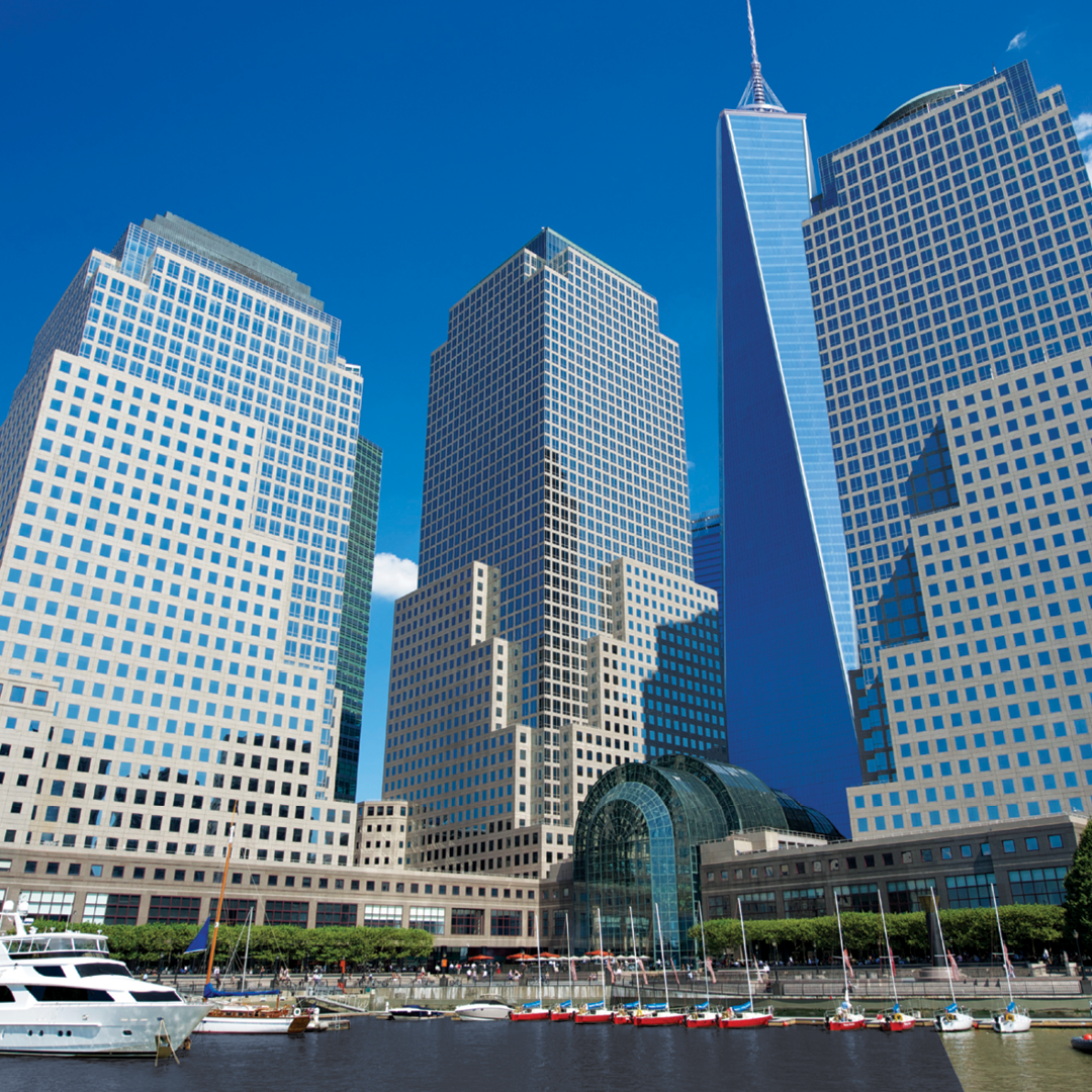 exterior shot of downtown Manhattan featuring several skyscrapers