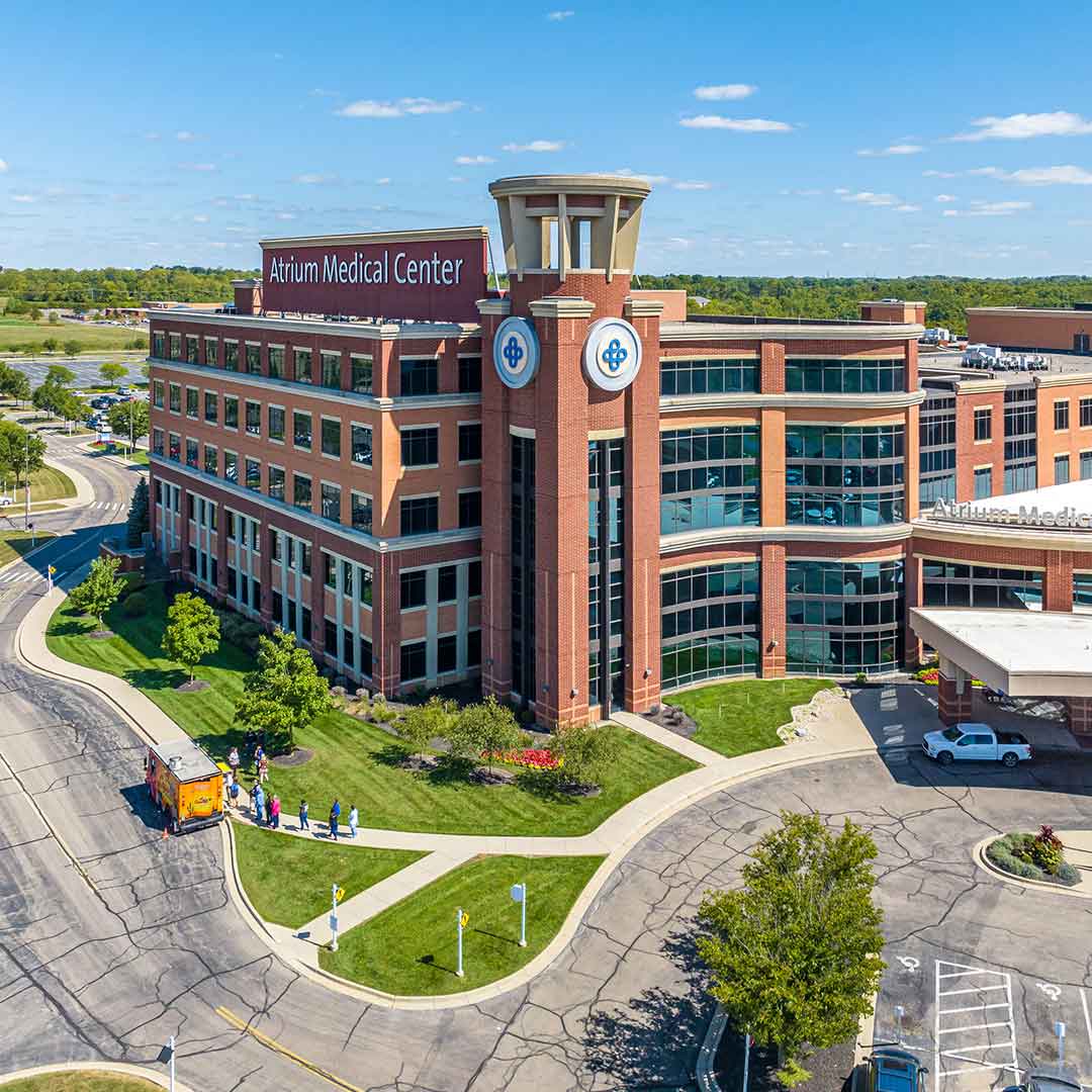 Exterior of Atrium Medical Center with greenspace around the building