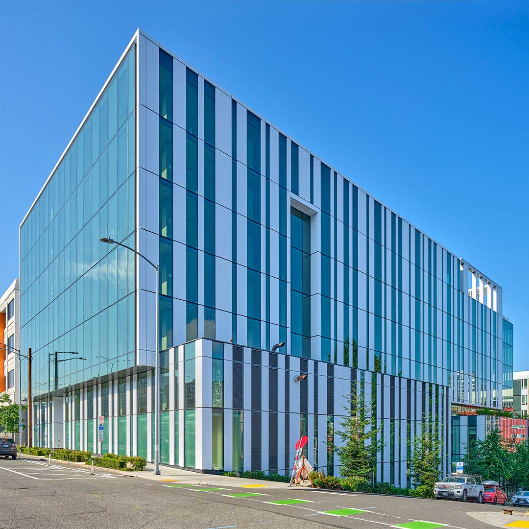 Exterior of 330 Yale with floor to ceiling glass windows.