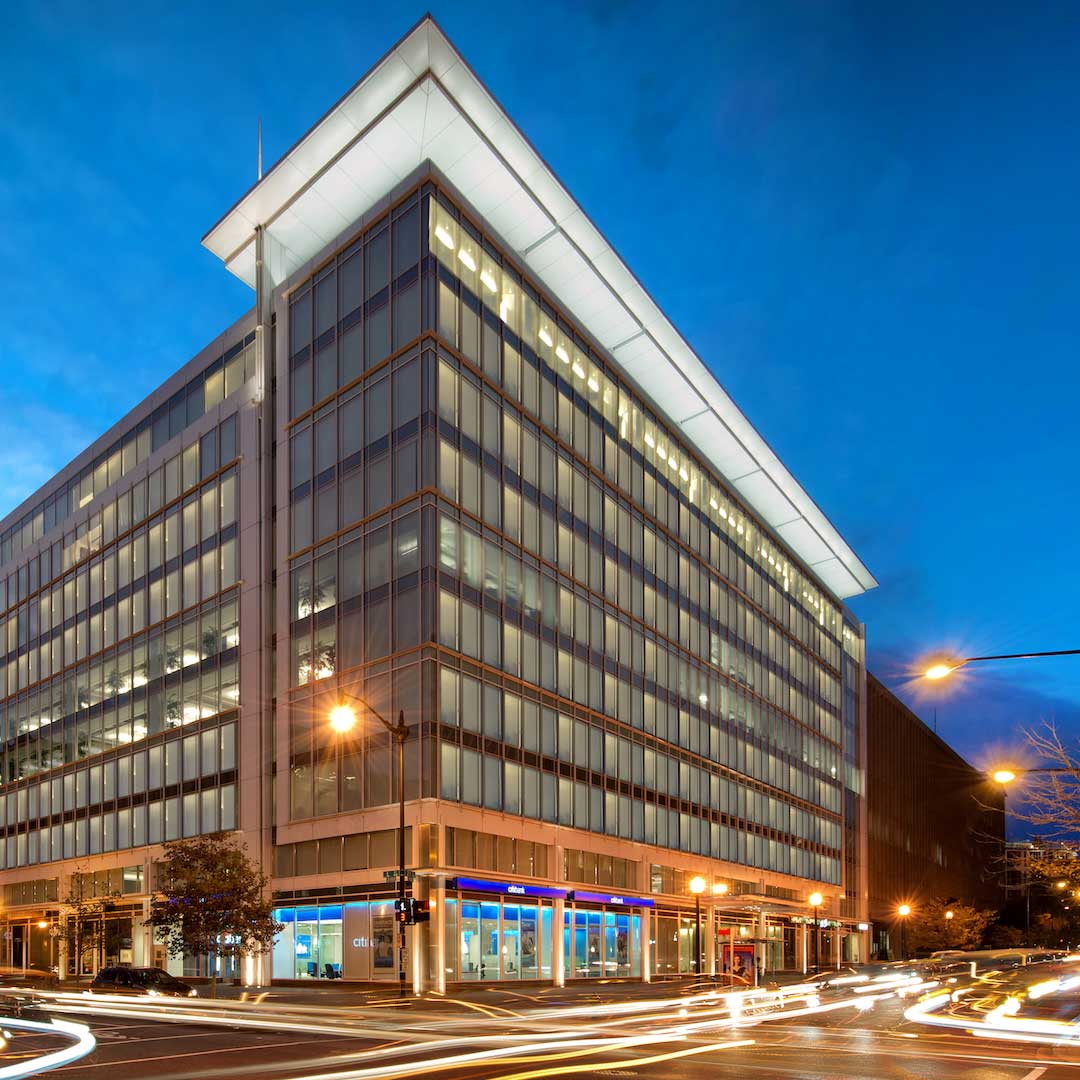 A nighttime exterior view of 2101 L St NW