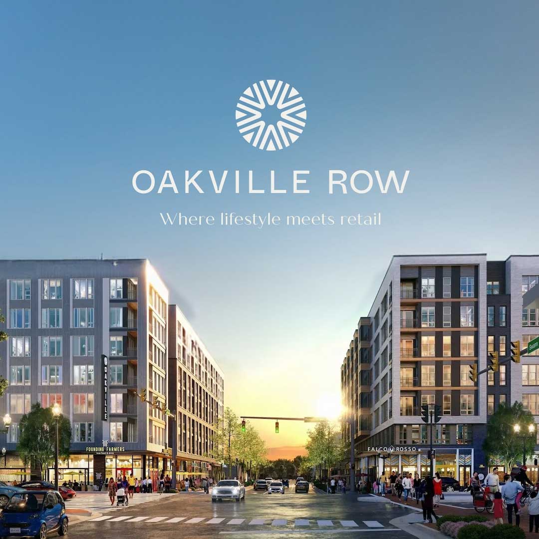 A daytime view of an intersection at Oakville Row