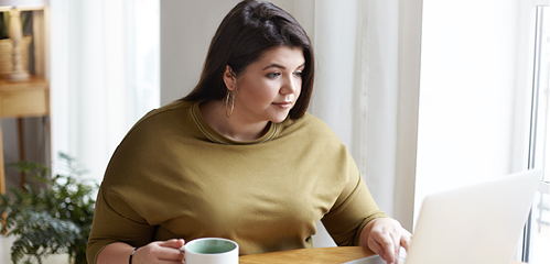 Image of woman using a laptop