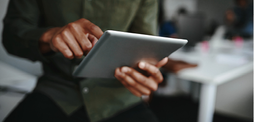 Image of person using a mobile tablet